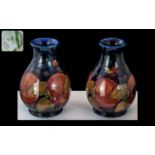 William Moorcroft Signed Matched Pair of Small Global Shaped Vases From the 1930's.