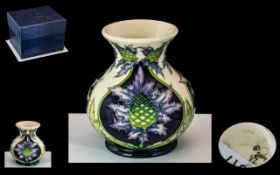 Moorcroft Bud Vase 'Scottish Thistle' dated 2004. Measures 4" tall.