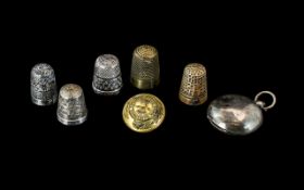 Collection of Three Silver Thimbles, together with two brass thimbles,
