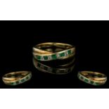 Ladies 9ct Gold Attractive 9ct Gold Emerald and Diamond Set Dress Ring.