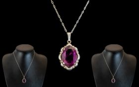 A Sterling Silver Necklace And Amethyst Set Pendant Drop. Excellent Condition. Length 18 inches.