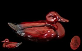 Royal Doulton Flambe Duck Figure, dark red, measures 7.5" length x 4" high.
