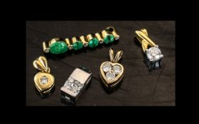 A Collection Of Five 18ct Diamond Pendants, One Set With Alternating Emerald And Diamonds.