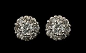 18ct White Gold Attractive Pair of Diamond Set Cluster Earrings. Marked for 18ct.