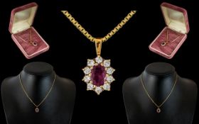 Ladies 18ct Gold Attractive Ruby and Diamond Set Pendant - In Flower head Design.