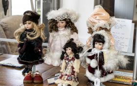 Collection of Five Dolls Dressed in Victorian Costume, with porcelain faces,