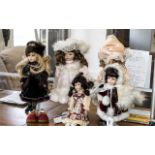 Collection of Five Dolls Dressed in Victorian Costume, with porcelain faces,