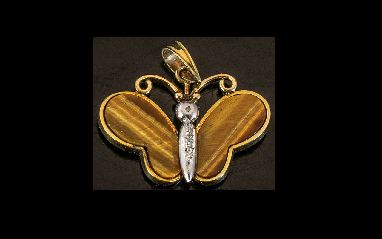 14ct Gold Butterfly Brooch Set With Tiger Eye Wings And Diamond Chip Body,