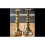 Pair of Brass Candlesticks, raised on stepped base, measure 10" tall.