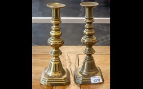 Pair of Brass Candlesticks, raised on stepped base, measure 10" tall.