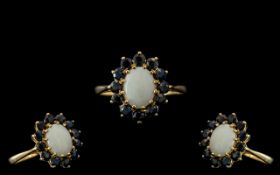 Ladies 9ct Gold Attractive Opal and Sapphire Set Dress Ring, Flower head Design.