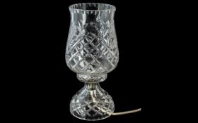 Victorian Cut Glass Two-Piece Table Lamp, raised on a pedestal base, measures 12" tall.