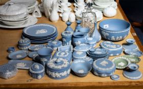 Collection of Wedgwood Blue Jasper Ware, comprising a large bowl, 5 plates, assorted trinket boxes,