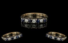 Ladies 9ct Gold Attractive Diamond and Sapphire Set Ring. Full Hallmark to Interior of Shank.