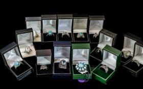 Collection of Fourteen Silver Dress Rings, set with coloured crystals, stones, pearls, etc.