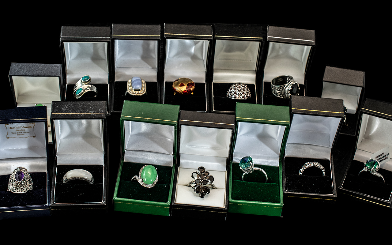 Collection of Thirteen Silver Dress Rings, set with coloured crystals, stones, pearls, etc.