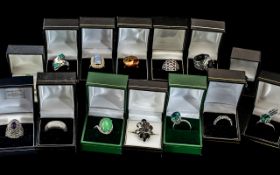 Collection of Thirteen Silver Dress Rings, set with coloured crystals, stones, pearls, etc.