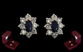 Ladies Fine Pair of 18ct Gold Pair of Sapphire and Diamond Set Earrings. Marked 18ct - 750.