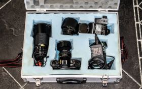 Photography Interest - Boxed Camera Equipment, comprising a Canon A-1 camera, lenses, flash,