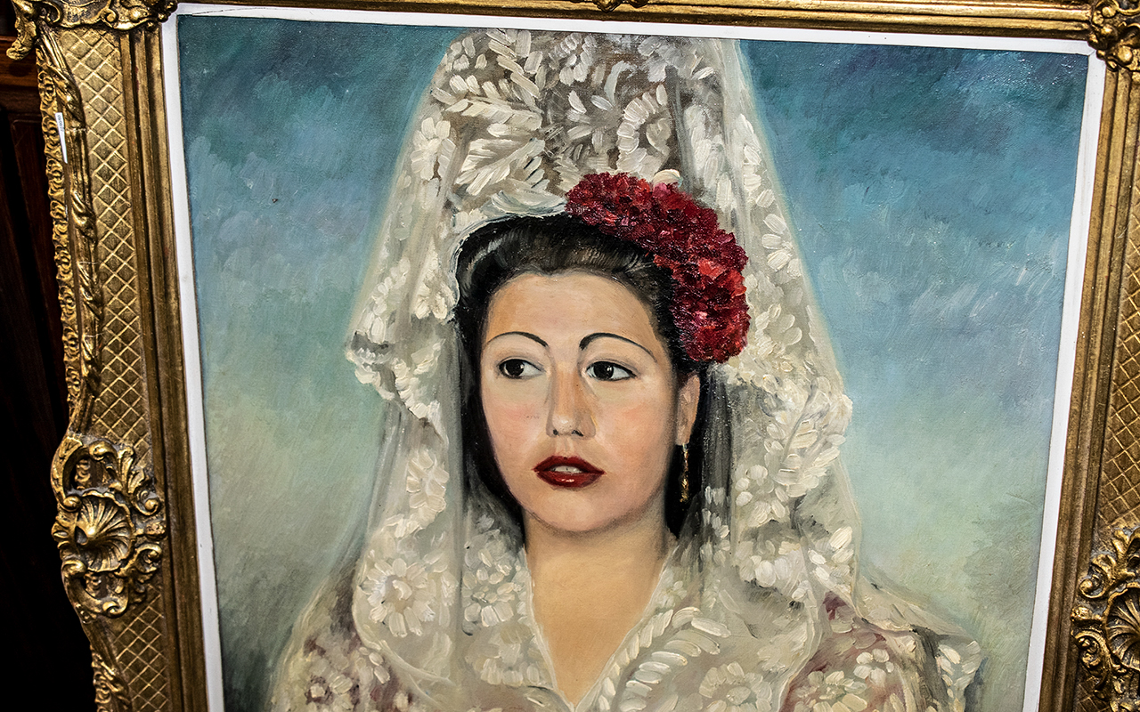 Large Oil on Canvas depicting a Spanish Senorita in traditional dress. Framed in an ornate gilt - Image 2 of 2