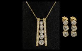 14ct Gold Diamond Pendant And Earring Set.