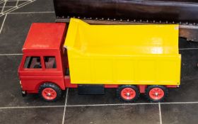 Painted Wooden Tipper Truck, red body and yellow tipper, length 27", height 12".