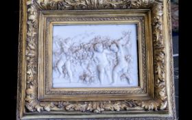 Framed Plaque Depicting Putti & Flora, housed in an earlier frame. Measures 28" x 24" overall.