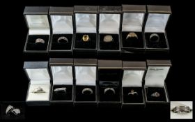 Collection of Fourteen Silver Dress Rings, set with coloured crystals, stones, etc.