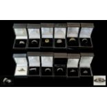 Collection of Fourteen Silver Dress Rings, set with coloured crystals, stones, etc.