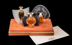 Lalique Miniatures Set of Three Scent Bottles, Les Flagons Miniatures, in a fitted box with