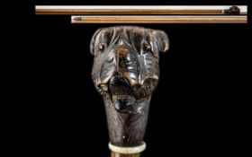 Walking Cane with a Bulldog Terminal with moving mouth. Length 35".