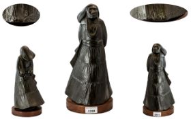 Bronze Figure of a Yazzie Girl signed by M Pettigrew. Cast bronze figure of Yazzie girl signed and