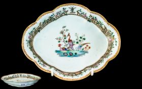 An Antique Chinese Lobed Dish, with central stylised peacocks. Length 8.25" x 6.5".