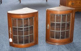 Two Oak Corner Cabinets, with leaded gla