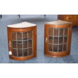 Two Oak Corner Cabinets, with leaded gla