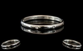 18ct White Gold Diamond Band Set With Ei