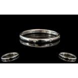 18ct White Gold Diamond Band Set With Ei