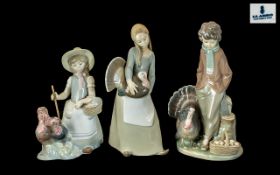 A Collection of Three Lladro Figures to
