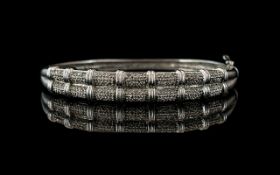 9ct White Gold Diamond Hinged Bangle - T