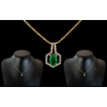18ct Gold Diamond and Emerald Set Pendant Drop - Attached to a 18ct Gold Chain. Marked 750.