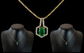 18ct Gold Diamond and Emerald Set Pendant Drop - Attached to a 18ct Gold Chain. Marked 750.