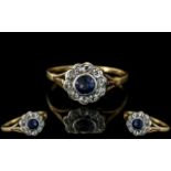 18ct Gold and Platinum Diamond and Sapphire Set Cluster Ring. Marked to Interior of Shank.