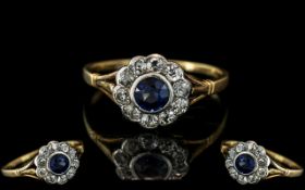 18ct Gold and Platinum Diamond and Sapphire Set Cluster Ring. Marked to Interior of Shank.