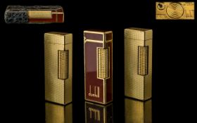 A Fine Trio of Dunhill Lighters From the 1960's / 1970's. All Made In Switzerland.