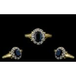 18ct Gold Attractive Sapphire and Diamond Set Cluster Ring, hallmarked to interior of shank, the