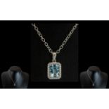 18ct White Gold - Superb Aquamarine and Diamond Set Pendant with Attached Sterling Silver Chain.