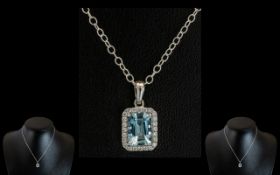 18ct White Gold - Superb Aquamarine and Diamond Set Pendant with Attached Sterling Silver Chain.