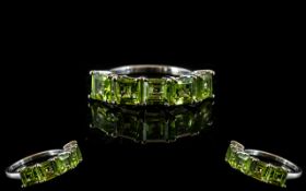 Peridot Half Eternity Ring, a row of five square cut, bright, spring green peridots,