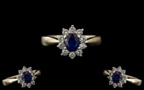 18ct Gold Attractive and Petite Diamond and Sapphire Set Ring, flower head setting with central