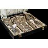 Silver Dressing Table Set, comprising a mirror, two hairbrushes, comb, and two clothes brushes,